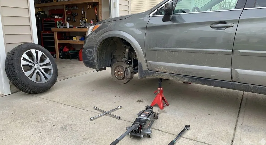 Brake job in progress on jack stands